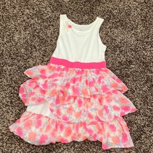 This a dress that is great for parties, and it has a little flower on the top